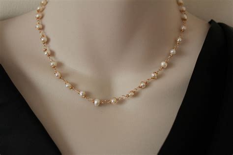 peoples jewellers pearl necklace .